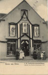Gruss aus Osten, J.H. Oellerichs Geschäftshaus,während des Bezirks - Kriegertages 1907.